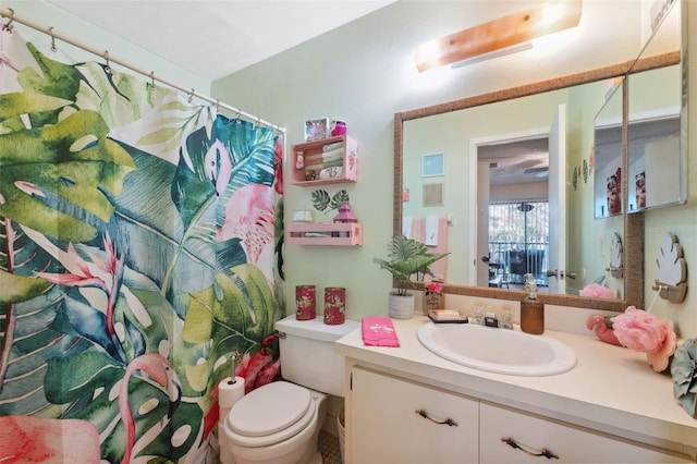 bathroom with vanity and toilet