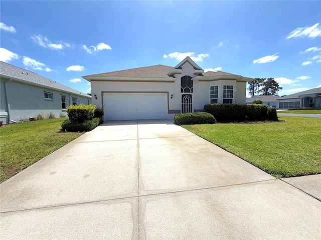 11204 Clear Oak Cir, New Port Richey, FL 34654 - ranch-style home featuring stucco siding, a garage, concrete driveway, and a front lawn