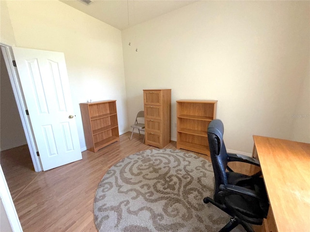 11204 Clear Oak Cir, New Port Richey, FL 34654 - home office with light wood-type flooring and baseboards
