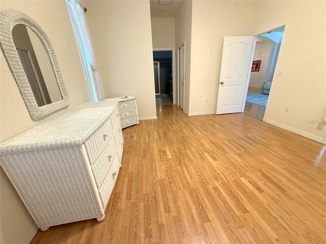 11204 Clear Oak Cir, New Port Richey, FL 34654 - unfurnished bedroom with light wood-type flooring and baseboards