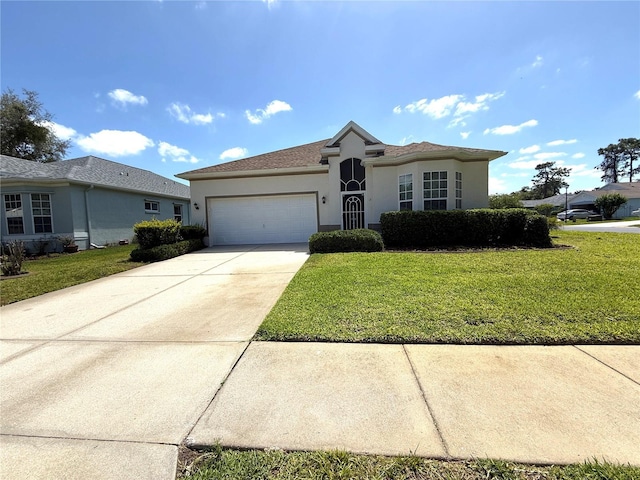 11204 Clear Oak Cir, New Port Richey, FL 34654 - single story home with stucco siding, a garage, a front lawn, and concrete driveway