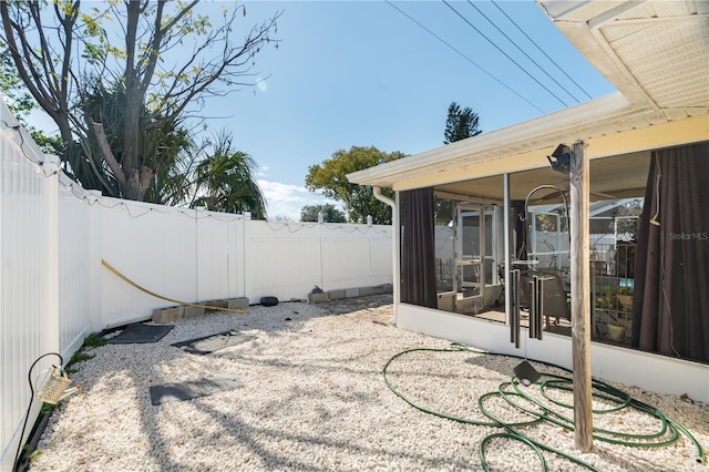 view of patio / terrace with a sunroom