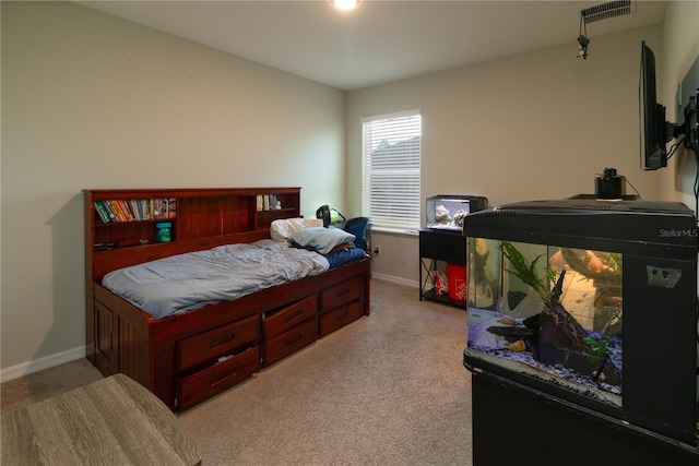 11134 Horned Owl Rd, Weeki Wachee, FL 34614 - carpeted bedroom with baseboards and visible vents