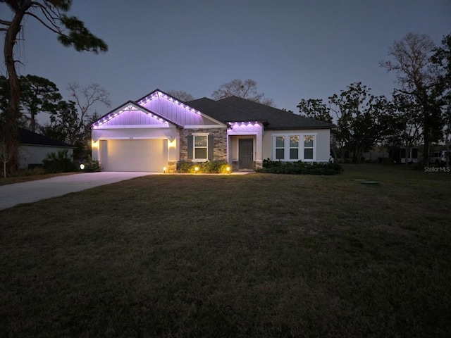11134 Horned Owl Rd, Weeki Wachee, FL 34614 - single story home featuring a garage, stone siding, a front yard, and concrete driveway