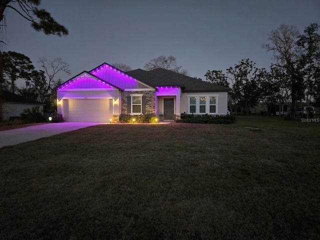 11134 Horned Owl Rd, Weeki Wachee, FL 34614 - ranch-style home featuring concrete driveway, a front lawn, stone siding, and a garage