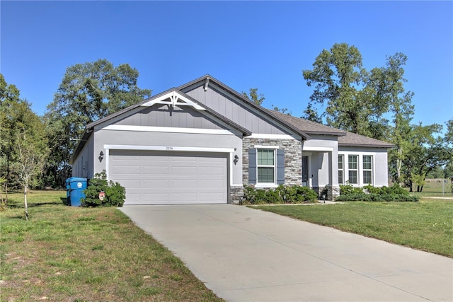 11134 Horned Owl Rd, Weeki Wachee, FL 34614 - craftsman house with an attached garage, stone siding, driveway, and a front yard