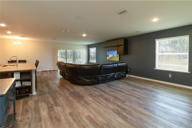 11134 Horned Owl Rd, Weeki Wachee, FL 34614 - living room with baseboards, visible vents, recessed lighting, and dark wood finished floors