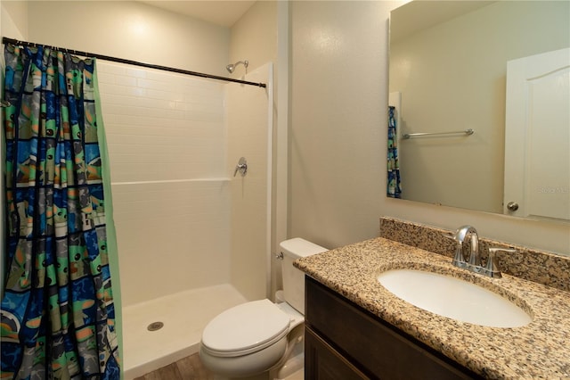 11134 Horned Owl Rd, Weeki Wachee, FL 34614 - full bathroom with vanity, a shower stall, and toilet