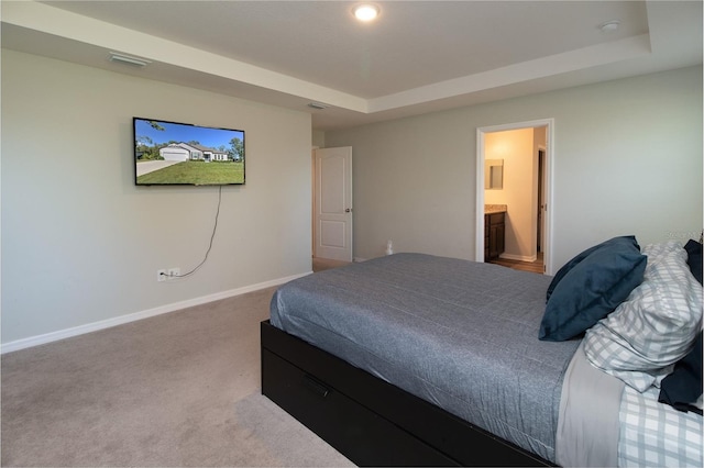 11134 Horned Owl Rd, Weeki Wachee, FL 34614 - bedroom with baseboards, carpet flooring, a tray ceiling, and visible vents