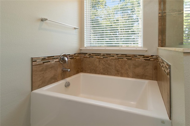 11134 Horned Owl Rd, Weeki Wachee, FL 34614 - full bathroom featuring a bath and a textured wall