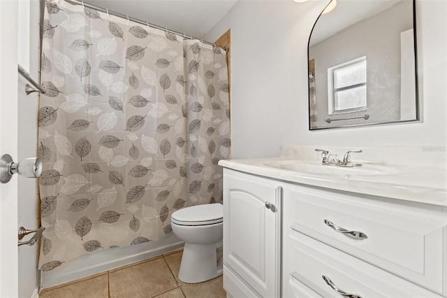 full bathroom with tile patterned flooring, a shower with shower curtain, vanity, and toilet