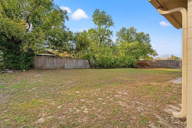 view of yard featuring a fenced backyard