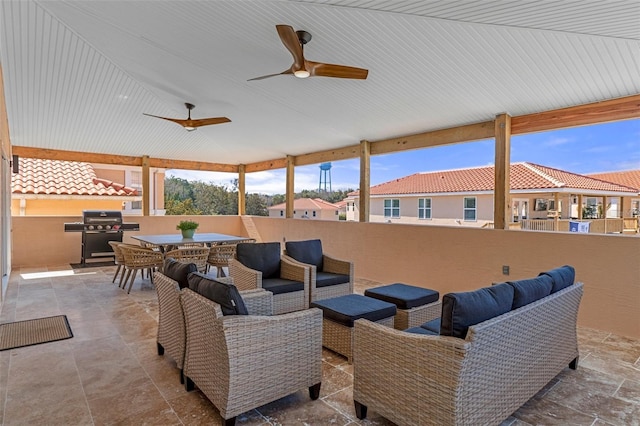 view of patio featuring ceiling fan, grilling area, and an outdoor hangout area