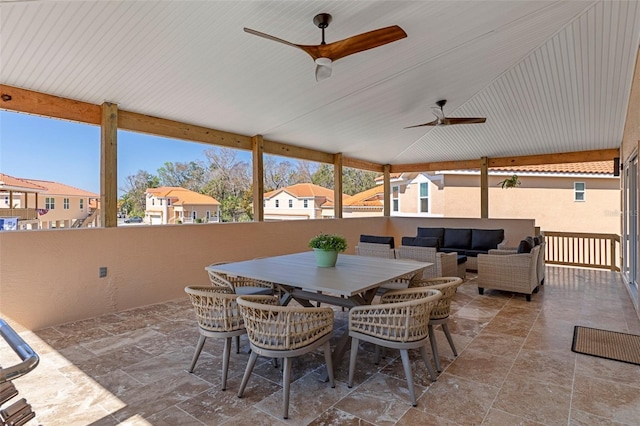 view of patio with an outdoor living space and ceiling fan