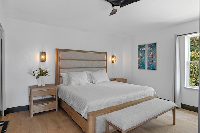 10209 W Waterlander Loop Unit 164, Homosassa, FL 34448 - bedroom with wood finished floors and a ceiling fan