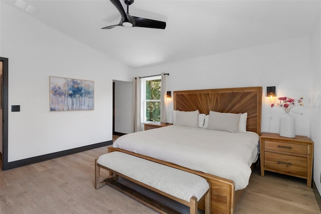 10209 W Waterlander Loop Unit 164, Homosassa, FL 34448 - bedroom featuring light wood-type flooring, lofted ceiling, and a ceiling fan