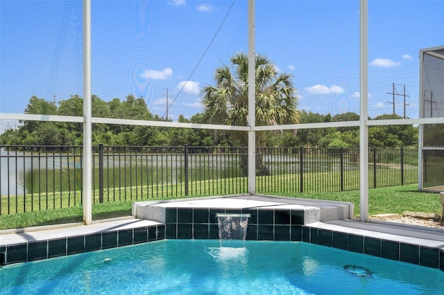 view of pool with a yard