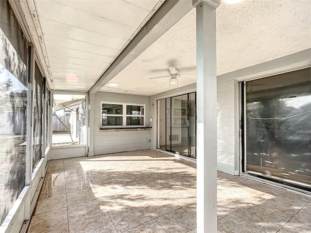 view of patio / terrace featuring ceiling fan