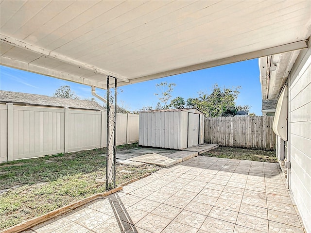 view of patio featuring a storage shed