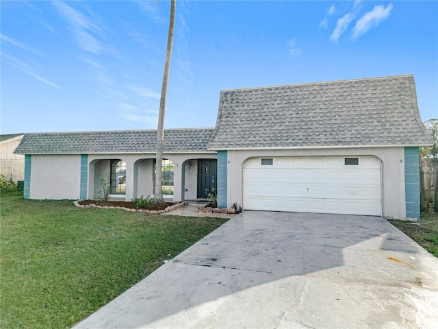 single story home featuring a garage and a front yard