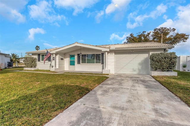 ranch-style house featuring central AC unit, a garage, and a front yard