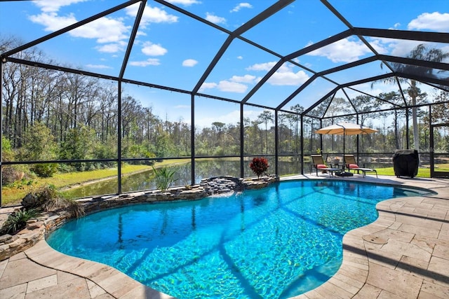 outdoor pool featuring a lanai and a patio area