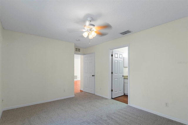 unfurnished bedroom with ceiling fan and carpet flooring