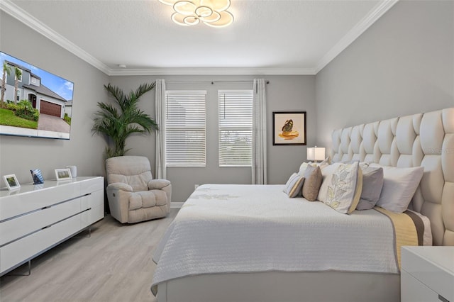 bedroom featuring wood finished floors and ornamental molding