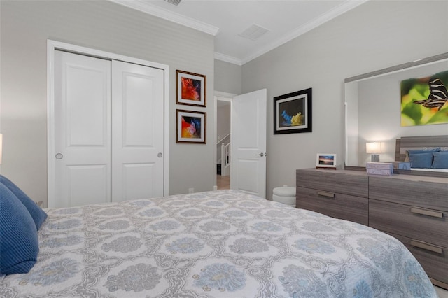 bedroom with a closet and crown molding