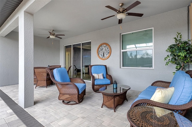 view of patio / terrace featuring a ceiling fan