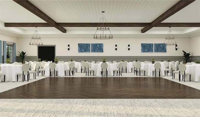 dining space featuring beam ceiling