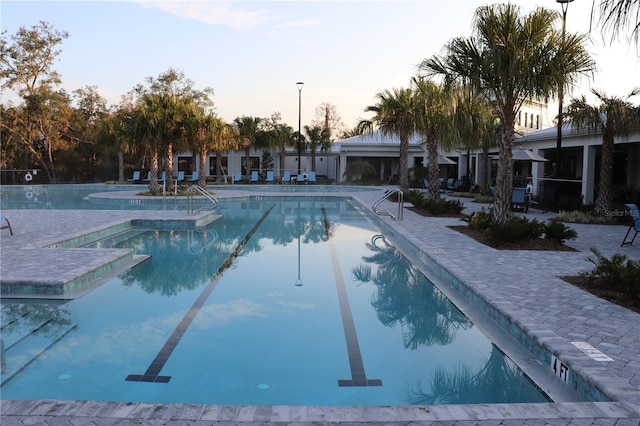 community pool with a patio