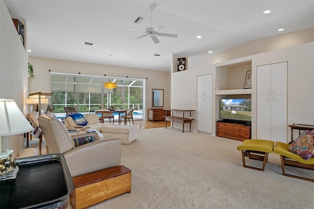 living room with a ceiling fan, recessed lighting, visible vents, and light carpet