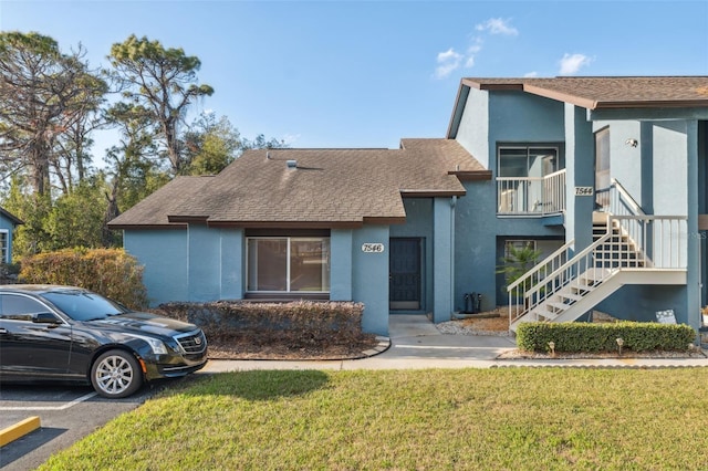 view of front of home with a front yard