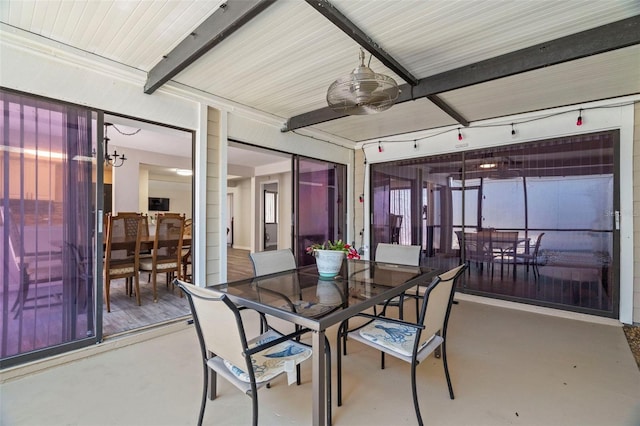 dining area featuring concrete flooring