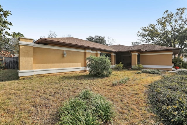 view of front of home with a front yard