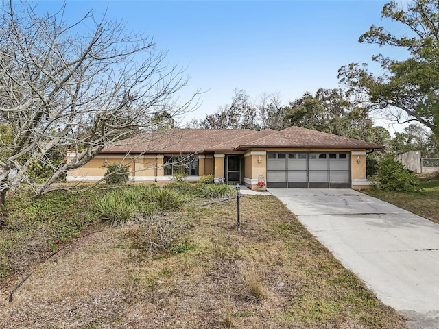 view of front of property with a garage