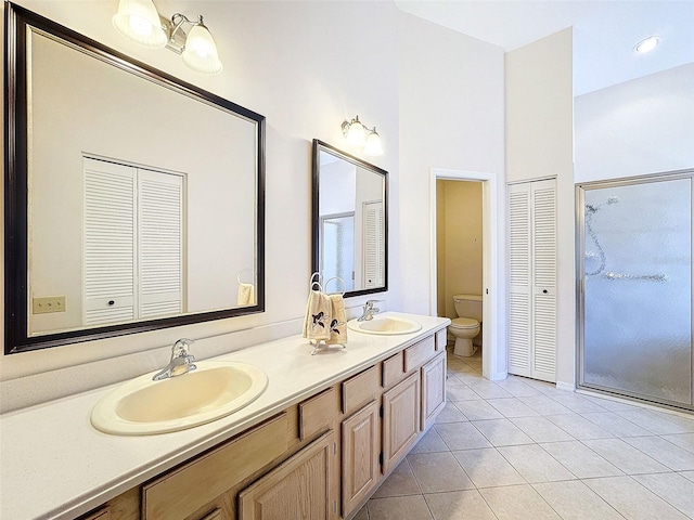 8447 Pavilion Dr, Hudson, FL 34667 - full bath with a closet, a sink, toilet, and tile patterned flooring