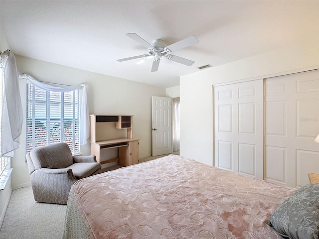 8447 Pavilion Dr, Hudson, FL 34667 - carpeted bedroom featuring visible vents, a closet, and ceiling fan