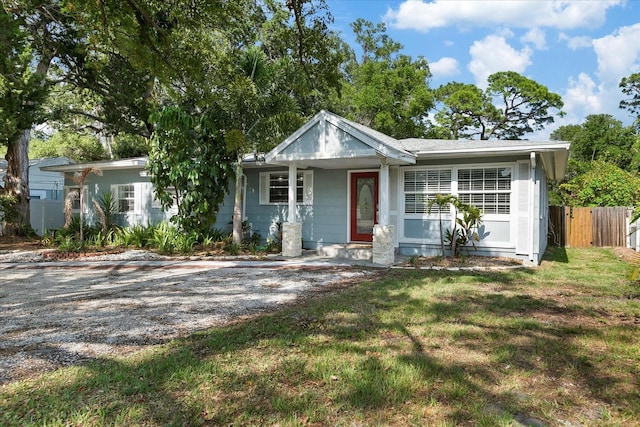 1101 N Betty Ln, Clearwater, FL 33755 - view of front facade featuring a porch