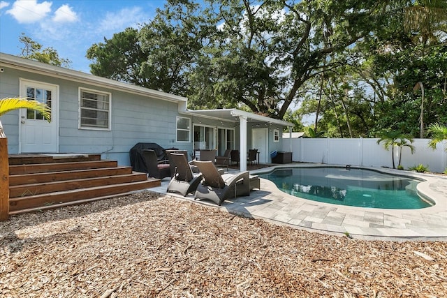 1101 N Betty Ln, Clearwater, FL 33755 - view of swimming pool with a fenced backyard and a patio