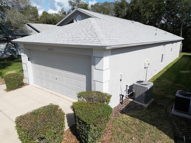 garage with central AC unit