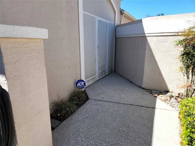 exterior space with stucco siding