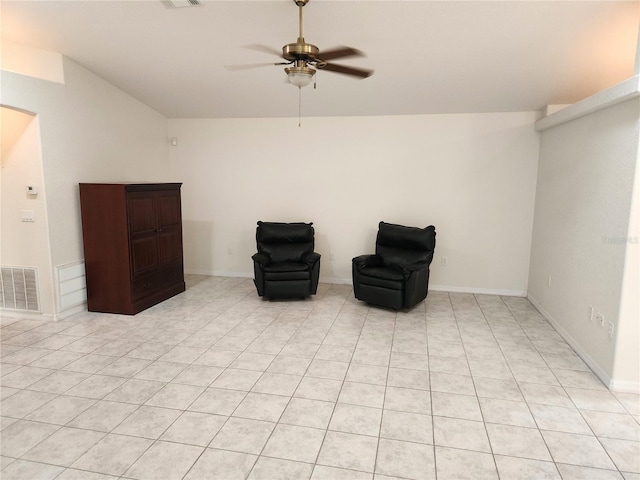 unfurnished room with baseboards, visible vents, a ceiling fan, and lofted ceiling