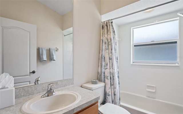 full bathroom featuring vanity, toilet, and shower / bathtub combination with curtain