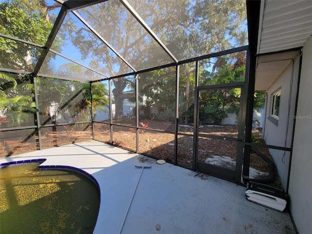 view of patio with a lanai