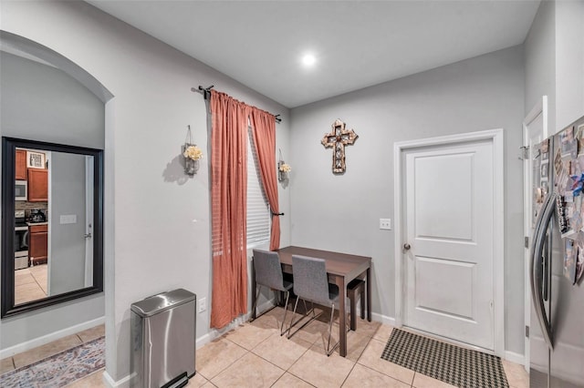 laundry room with light tile patterned floors