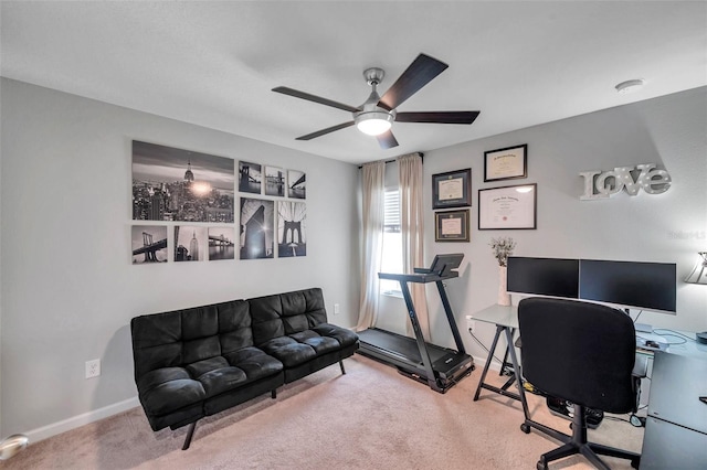 carpeted office with ceiling fan