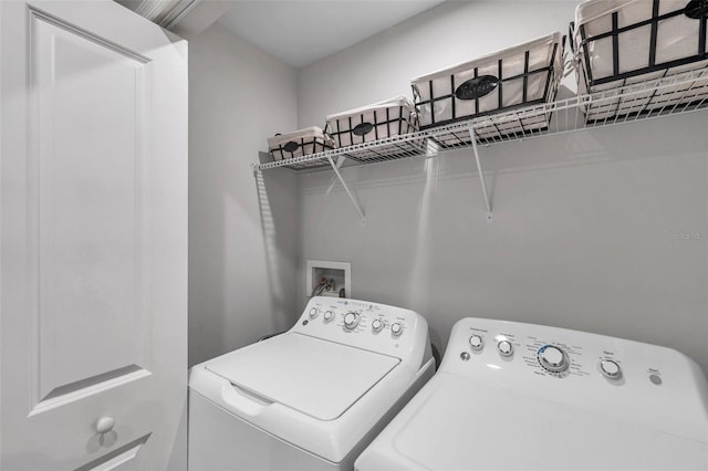 laundry room featuring independent washer and dryer