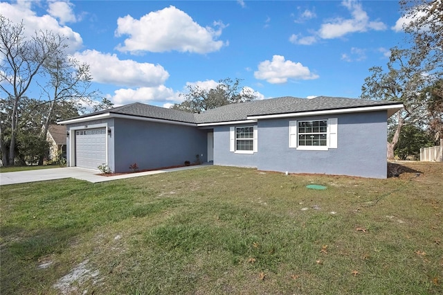 single story home featuring a garage and a front lawn